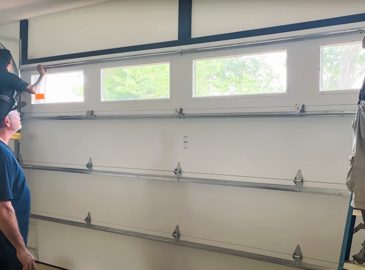 Custom garage door installation in Sun City Center, Florida, showcasing a modern design with durable materials and expert craftsmanship.