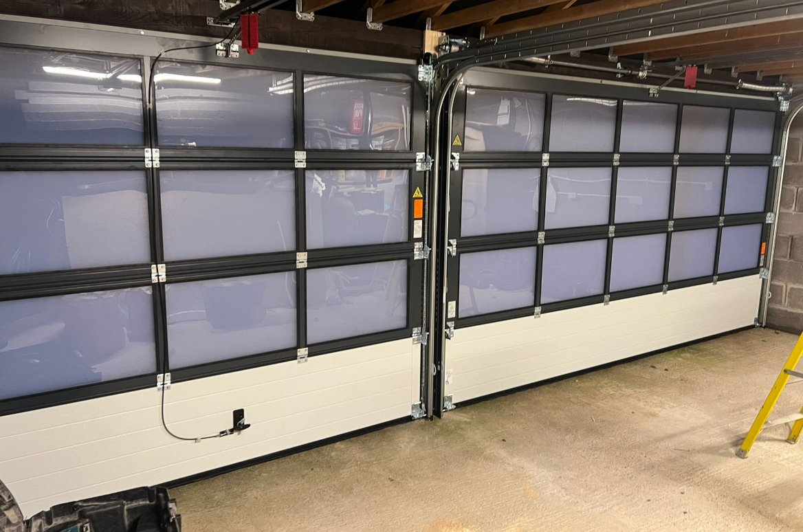 Technician performing a garage door panel repair in Sun City Center, Florida, ensuring smooth operation and a seamless finish