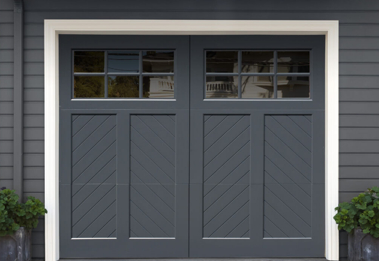 Custom garage door installation in Sun City Center, Florida, featuring a modern design with durable materials and expert craftsmanship.