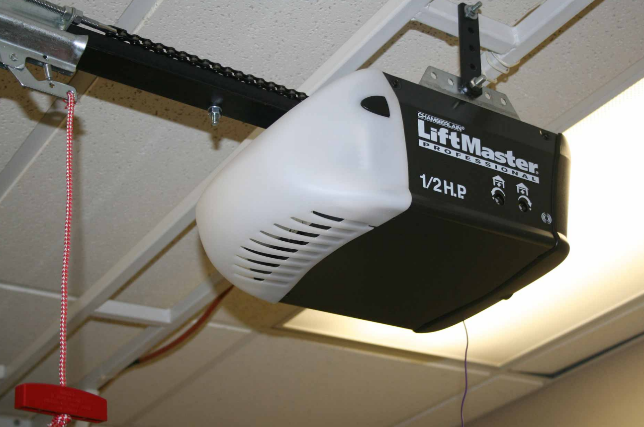 Technician repairing a garage door opener in Sun City Center, Florida, with professional equipment.