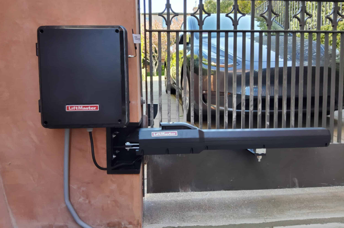 Automated gate installed for a residential property in Sun City Center, Florida, showcasing advanced garage door and gate repair services.